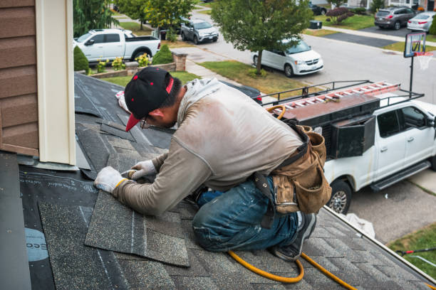 Professional Roofing technician working in Thor, IA